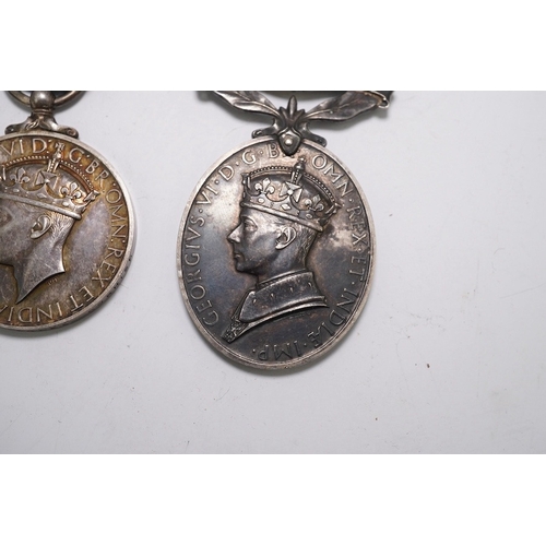 350 - Three assorted service medals; Ed VII Volunteer Officer's Decoration hallmarked for 1905; GV Imperia... 