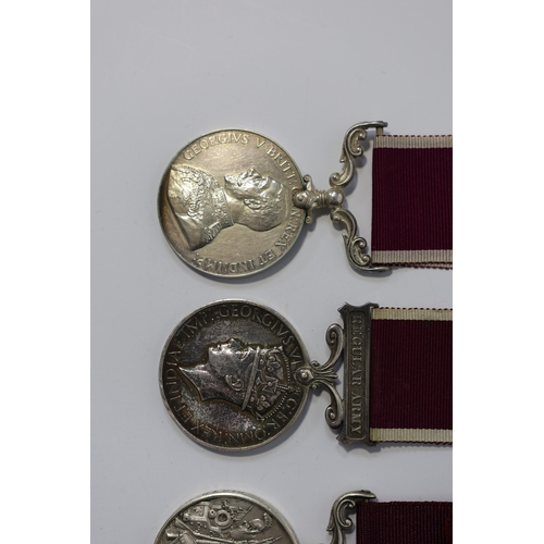 352 - Four Army Long Service and Good Conduct medals; Vict to 21579 Gunr A.Milln. R.A.; GV to 1404425 B.Q.... 