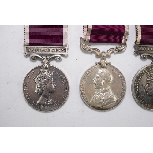 352 - Four Army Long Service and Good Conduct medals; Vict to 21579 Gunr A.Milln. R.A.; GV to 1404425 B.Q.... 