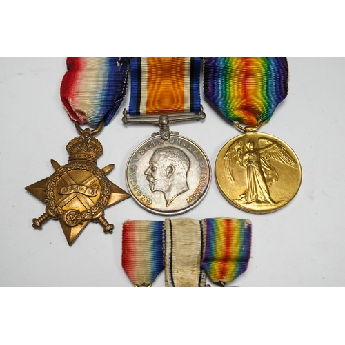 353 - A First World War medal trio awarded to the Rev. P.C.T. Crick A.C.D., together with the miniature se... 