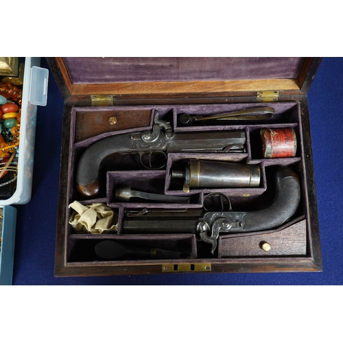 354 - A pair of rosewood cased Blake & Co. London percussion cap travelling pistols, with octagonal barrel... 