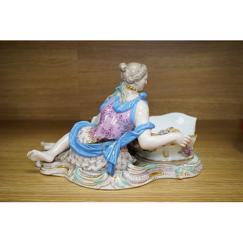 404 - A Meissen female figural dish,  27cm wide. Condition - dish damaged (pieces in bag), crack near fron... 