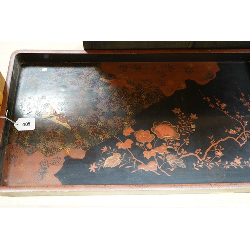 409 - Three trays to include a butterfly wing example and a Japanese lacquered example decorated with bird... 