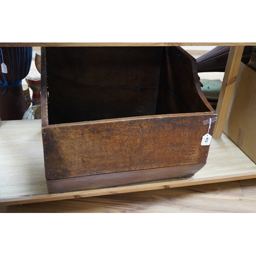 413 - An early 20th century oak dog basket, 65cm wide. Condition - fair