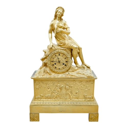 419 - A French Louis Philippe period Empire ormolu clock, with seated classical female upon a rock enclosi... 