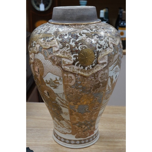 421 - A large Japanese satsuma pottery vase, decorated in relief, Meiji period, 40cm high. Condition - fai... 