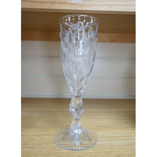 423 - A large floral engraved glass flute, 29.5cm. Condition - chip to upper rim