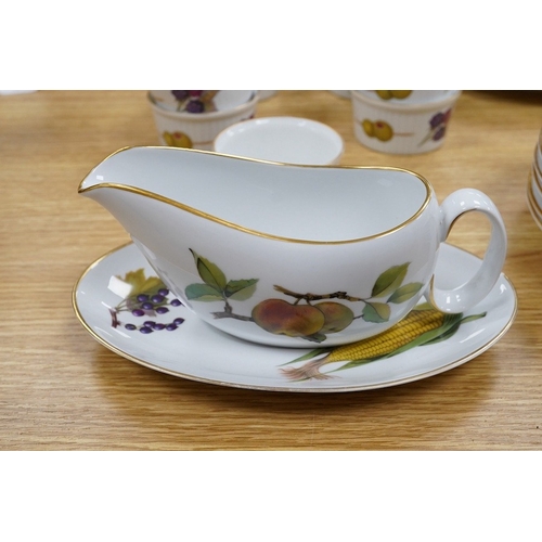 424 - A Royal Worcester Evesham pattern dinnerware to include dinner plates, soup bowls and ramekins, larg... 