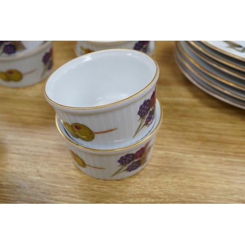 424 - A Royal Worcester Evesham pattern dinnerware to include dinner plates, soup bowls and ramekins, larg... 