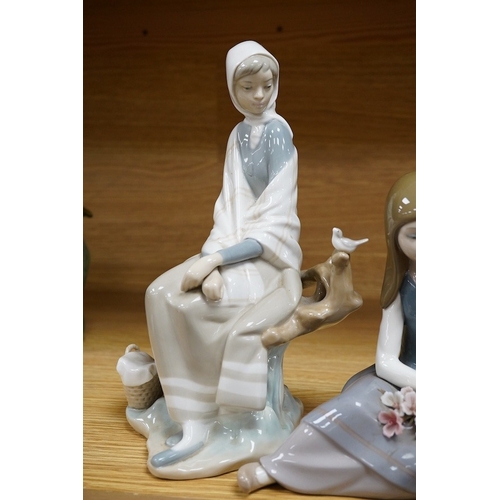 426 - Three various Lladro figures, tallest 24cm. Condition - fair to good