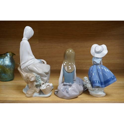 426 - Three various Lladro figures, tallest 24cm. Condition - fair to good