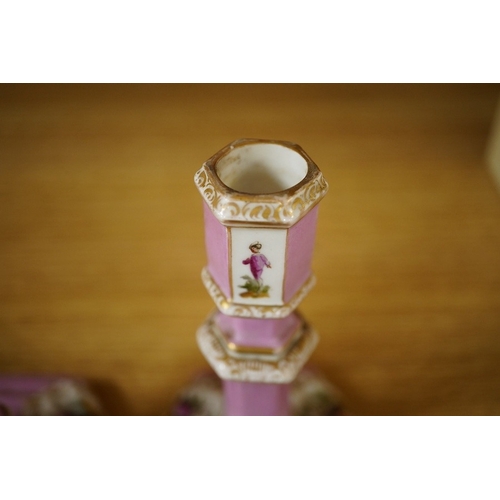 429 - A pair of Berlin porcelain pink ground octagonal candlesticks, late 19th century, 13.5cm. Condition ... 