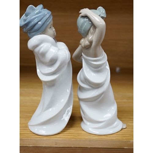 430 - Two Lladro figures of children, 19cm high. Condition - good