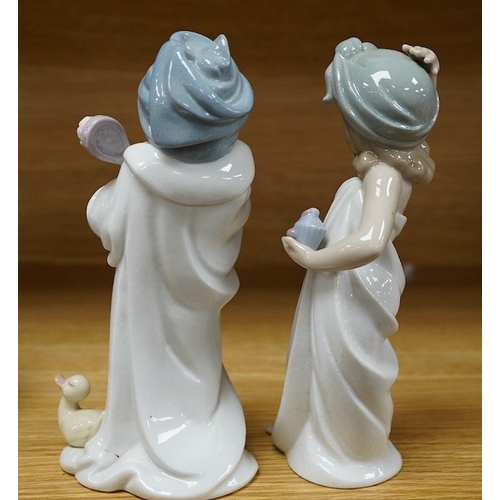 430 - Two Lladro figures of children, 19cm high. Condition - good