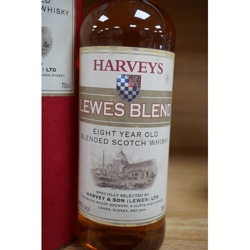 434 - A bottle of Harveys Lewes Blend eight-year old whisky with case. Condition - good