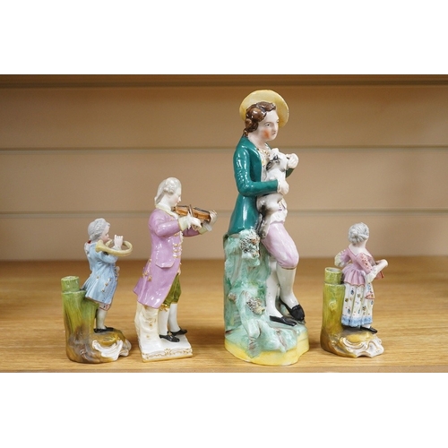 438 - A mid 19th century Staffordshire figure wearing a green jacket, a Berlin KPM figure of a violinist a... 