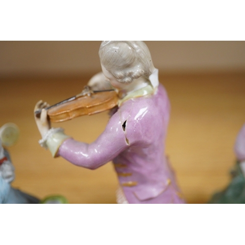 438 - A mid 19th century Staffordshire figure wearing a green jacket, a Berlin KPM figure of a violinist a... 