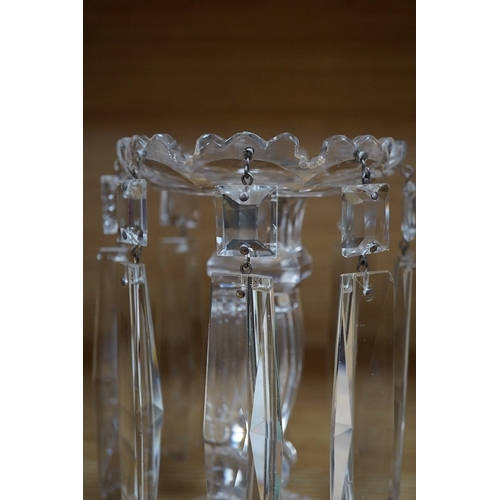 439 - A pair of glass lustre drop candlesticks, 18cm high. Condition - fair to good