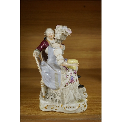 440 - A Sitzendorf tete-a-tete porcelain figure group, signed to the base, 21cm high. Condition - fair, so... 