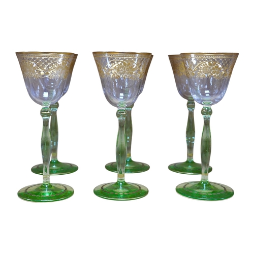 444 - A set of six Bohemian wine glasses with ornate gilt decorated bowls, height 19cm. Condition - good... 