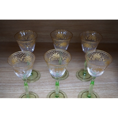 444 - A set of six Bohemian wine glasses with ornate gilt decorated bowls, height 19cm. Condition - good... 