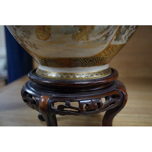 445 - A Japanese Satsuma pottery vase decorated with figures and landscapes, signed Choshuzan to the base,... 