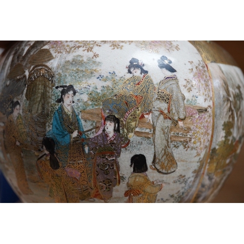 445 - A Japanese Satsuma pottery vase decorated with figures and landscapes, signed Choshuzan to the base,... 