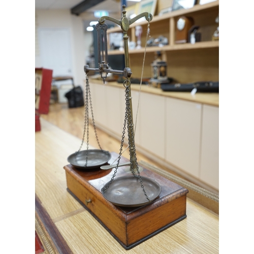 450 - A set of Victorian mahogany and brass beam scales, by Avery, with a repair letter dated 1940 include... 