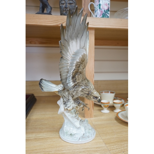 453 - Karl Tutter (1883-1969) for Kutschenreuther, a porcelain model of a hawk, 42cm. Condition - restorat... 