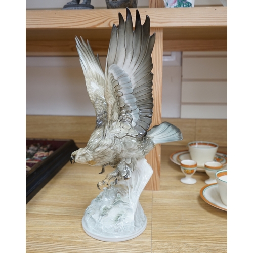 453 - Karl Tutter (1883-1969) for Kutschenreuther, a porcelain model of a hawk, 42cm. Condition - restorat... 