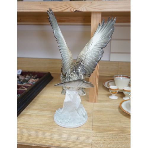 453 - Karl Tutter (1883-1969) for Kutschenreuther, a porcelain model of a hawk, 42cm. Condition - restorat... 