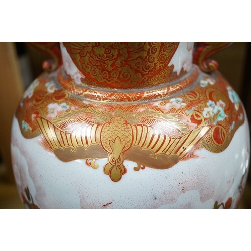 461 - A Japanese Kutani porcelain twin handled vase, Meiji period, decorated with warriors on horseback, 3... 