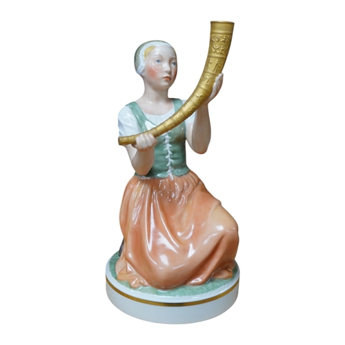 465 - A Royal Copenhagen figure of Kristine Svendsdatter, carrying the gilded horn of Gallahus, numbered 1... 