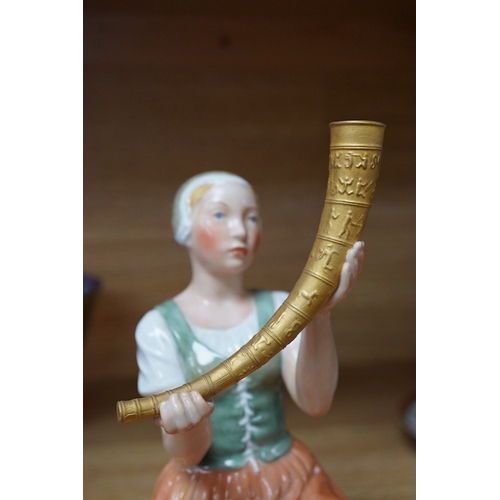 465 - A Royal Copenhagen figure of Kristine Svendsdatter, carrying the gilded horn of Gallahus, numbered 1... 