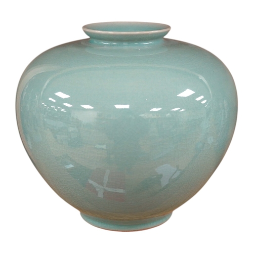 470 - A 20th century Korean celadon crackle glaze vase, base reads With compliment of Chung Ju Yung Chair... 