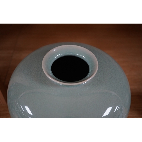 470 - A 20th century Korean celadon crackle glaze vase, base reads With compliment of Chung Ju Yung Chair... 