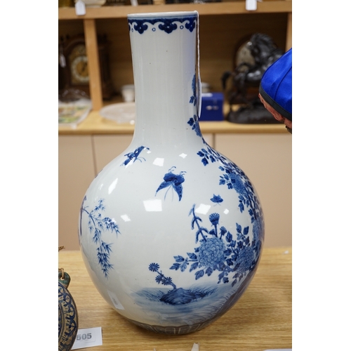 483 - A large Chinese blue and white bottle vase, 46cms high. Condition - good