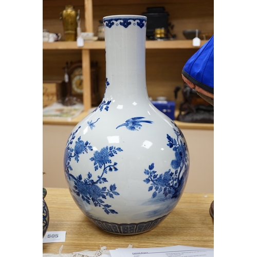 483 - A large Chinese blue and white bottle vase, 46cms high. Condition - good