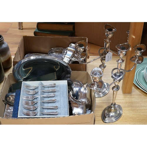 499 - A quantity of assorted plated ware including a pair of three light candelabra - 39cm high. Condition... 