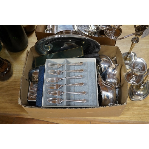 499 - A quantity of assorted plated ware including a pair of three light candelabra - 39cm high. Condition... 