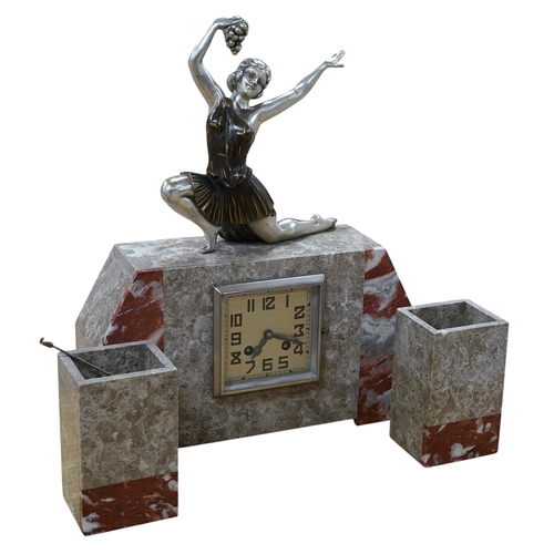 517 - A French Art Deco clock garniture of mixed marble with chromed and painted spelter female dancer sur... 