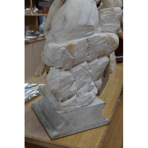 519 - A French 1920s-30s alabaster sculpture of a lady seated on a stone wall, sculpture mounted on a ma... 