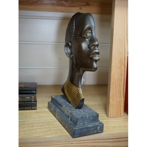 524 - An Art Deco Hagenauer style bronze study of an African lady, stepped marble base, 28cm. Condition - ... 