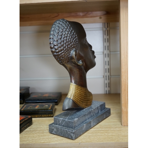 524 - An Art Deco Hagenauer style bronze study of an African lady, stepped marble base, 28cm. Condition - ... 