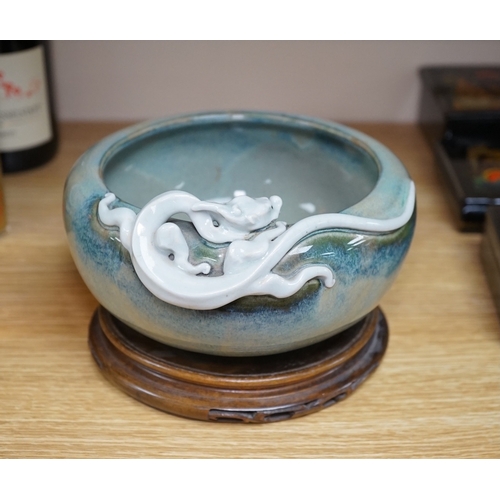 526 - A Japanese Sumidagawa ware dragon bowl, Meiji period, signed Ishiguro Koko, wood stand. Condition ... 