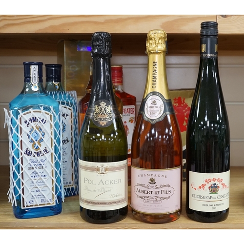 527 - Nine various bottles of wine and spirits to include Albert Et Fils champagne, Bells Scotch whisky an... 