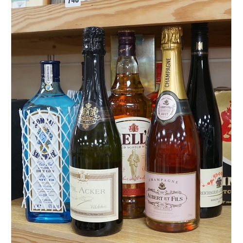 527 - Nine various bottles of wine and spirits to include Albert Et Fils champagne, Bells Scotch whisky an... 