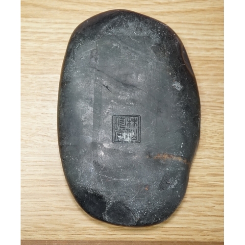 530 - A Chinese literati ink stone with calligraphy, 16cm wide. Condition - fair