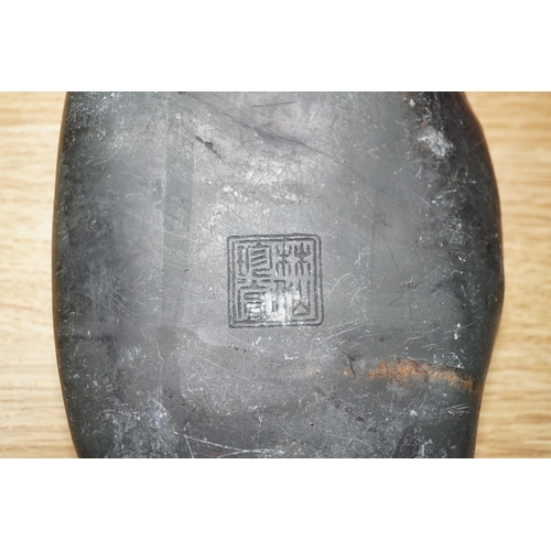 530 - A Chinese literati ink stone with calligraphy, 16cm wide. Condition - fair