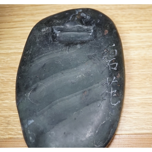 530 - A Chinese literati ink stone with calligraphy, 16cm wide. Condition - fair